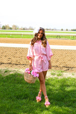 PINK BUTTON DOWN ROMPER