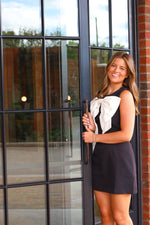 BLACK AND CREAM BOW MINI DRESS