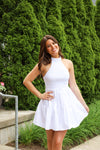 SMOCKED HALTER MINI DRESS IN WHITE